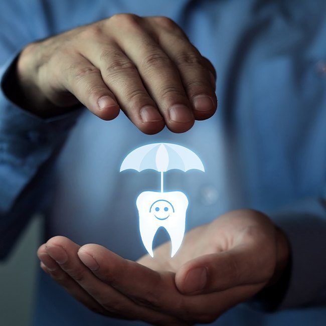 Animated tooth under an umbrella